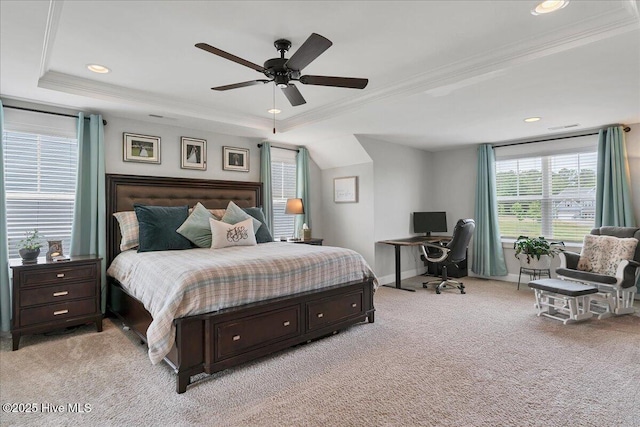 bedroom featuring a tray ceiling, crown molding, an office area, light colored carpet, and recessed lighting