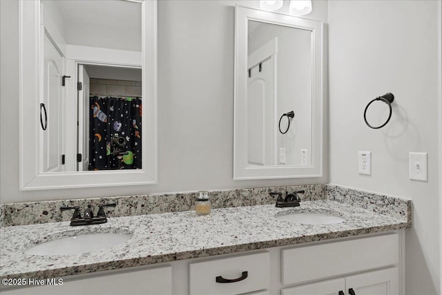 bathroom with double vanity