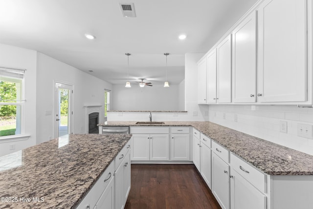 365 W Goldeneye Ln, Sneads Ferry, NC 28460 - kitchen featuring appliances with stainless steel finishes, a peninsula, pendant lighting, white cabinetry, and recessed lighting