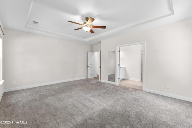 365 W Goldeneye Ln, Sneads Ferry, NC 28460 - unfurnished room featuring crown molding, a tray ceiling, carpet floors, and healthy amount of natural light