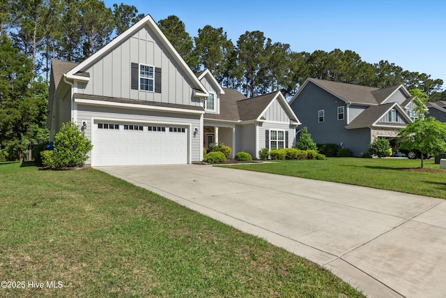 365 W Goldeneye Ln, Sneads Ferry, NC 28460 - craftsman-style house with board and batten siding, driveway, a garage, and a front yard