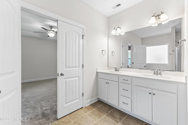 365 W Goldeneye Ln, Sneads Ferry, NC 28460 - bathroom with a stall shower, a walk in closet, a bath, and tile patterned floors