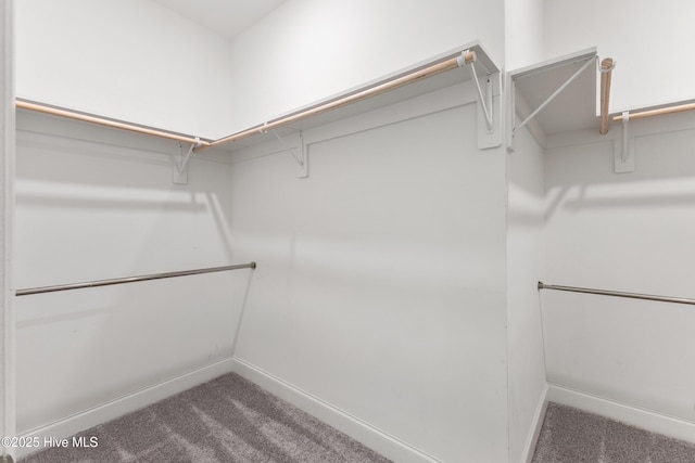 365 W Goldeneye Ln, Sneads Ferry, NC 28460 - bathroom with a ceiling fan, vanity, a bath, tile patterned flooring, and baseboards