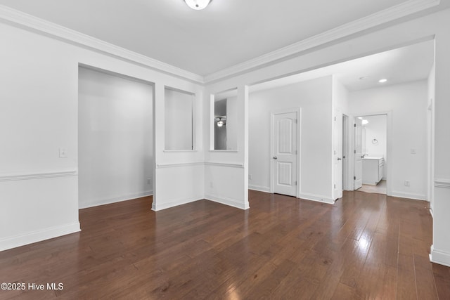365 W Goldeneye Ln, Sneads Ferry, NC 28460 - unfurnished bedroom featuring hardwood / wood-style flooring, baseboards, ornamental molding, and connected bathroom
