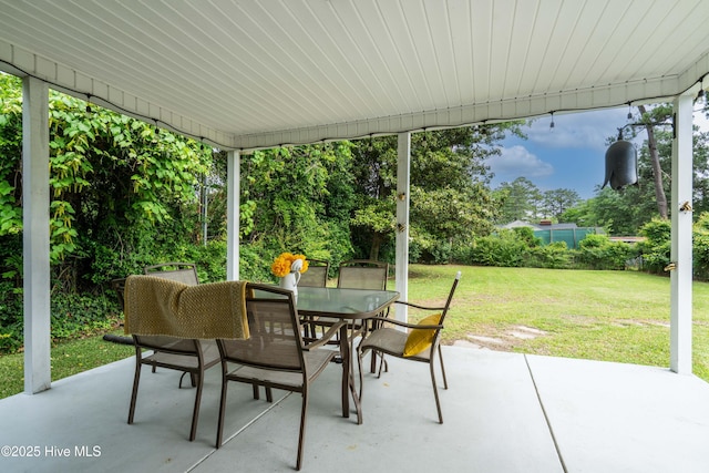 view of patio featuring outdoor dining area