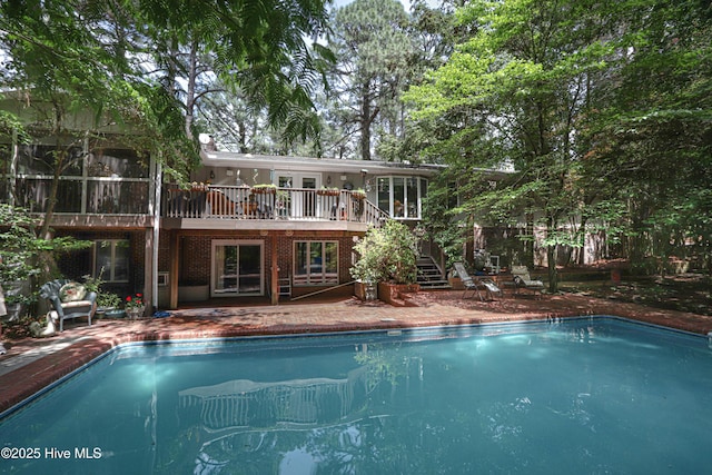 1 Collett Ln, Pinehurst, NC 28374 - swimming pool featuring stairway, a patio area, and a deck