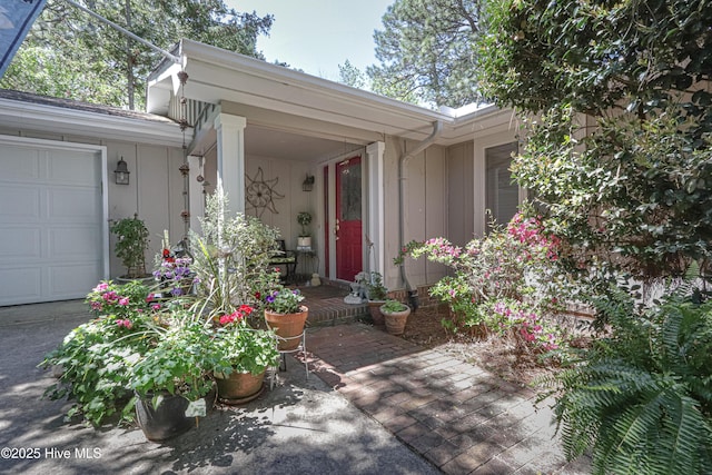 1 Collett Ln, Pinehurst, NC 28374 - entrance to property featuring board and batten siding and an attached garage