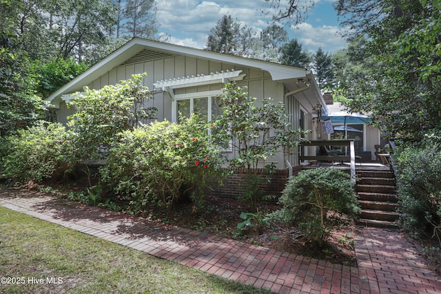 1 Collett Ln, Pinehurst, NC 28374 - view of side of property featuring board and batten siding