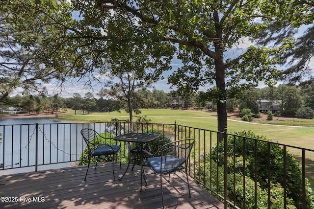 12 Shenecossett Ln, Pinehurst, NC 28374 - wooden deck featuring a water view, view of scattered trees, and view of golf course