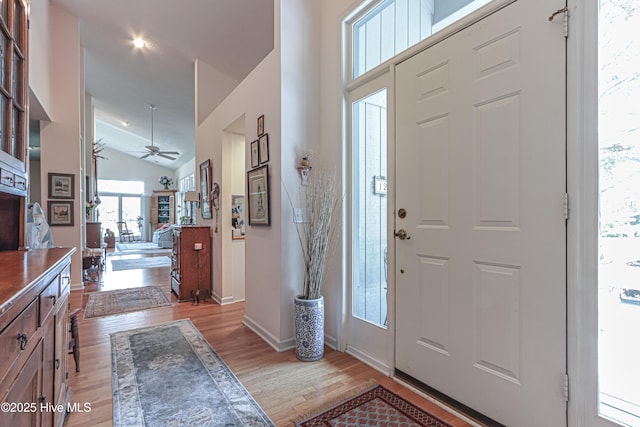 12 Shenecossett Ln, Pinehurst, NC 28374 - entryway with light wood-type flooring, a ceiling fan, vaulted ceiling, and baseboards