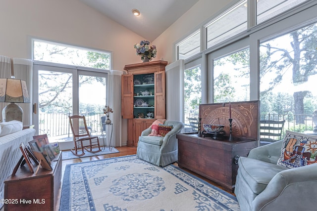 12 Shenecossett Ln, Pinehurst, NC 28374 - living area with high vaulted ceiling and light wood-style floors