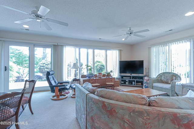 12 Shenecossett Ln, Pinehurst, NC 28374 - living room with ceiling fan, carpet floors, a textured ceiling, and recessed lighting