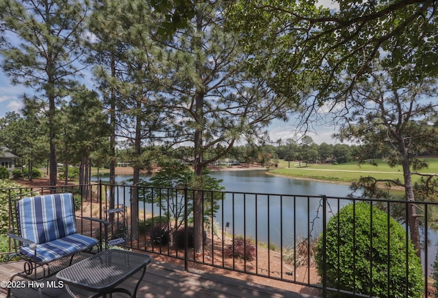 12 Shenecossett Ln, Pinehurst, NC 28374 - view of patio / terrace featuring a water view and view of wooded area