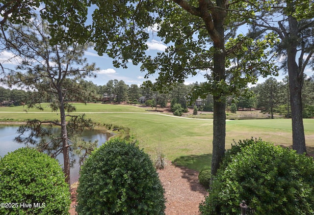 12 Shenecossett Ln, Pinehurst, NC 28374 - view of green lawn featuring a water view and golf course view