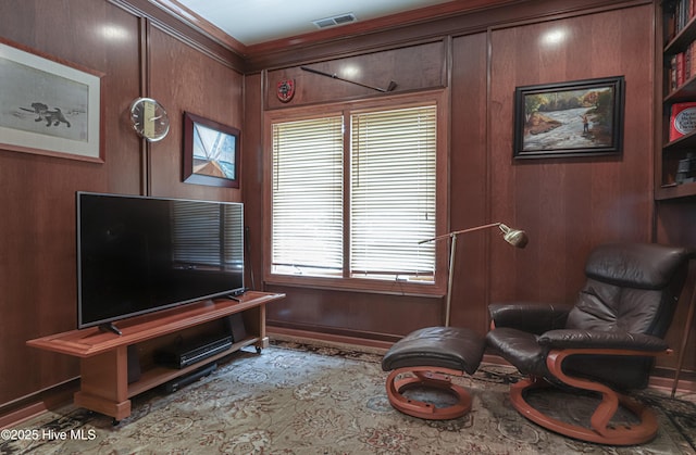 127 Sakonnet Trl, Pinehurst, NC 28374 - living area with ornamental molding, wood walls, and baseboards