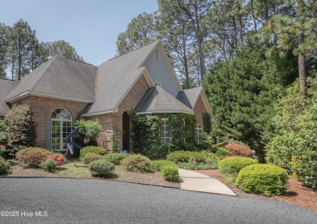 127 Sakonnet Trl, Pinehurst, NC 28374 - view of front of home featuring brick siding and a shingled roof