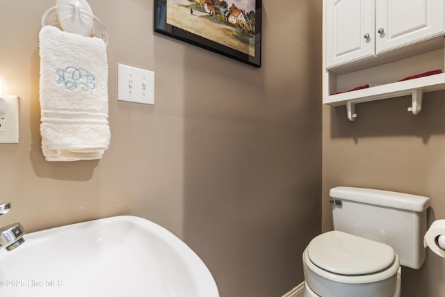 3243 Marsh View Dr SW, Supply, NC 28462 - bathroom featuring toilet and a sink
