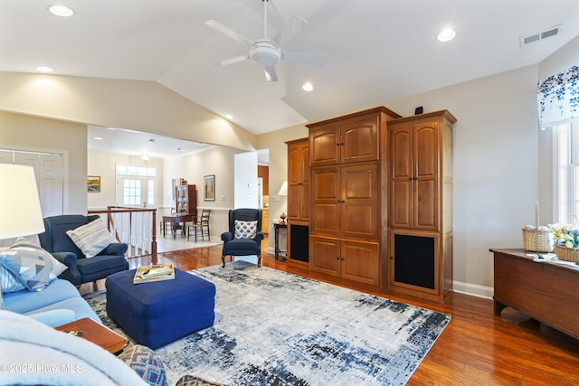 3243 Marsh View Dr SW, Supply, NC 28462 - living room featuring a ceiling fan, wood finished floors, vaulted ceiling, baseboards, and recessed lighting