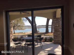 3243 Marsh View Dr SW, Supply, NC 28462 - dining room with a water view