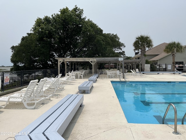 3243 Marsh View Dr SW, Supply, NC 28462 - community pool featuring a pergola and a patio area