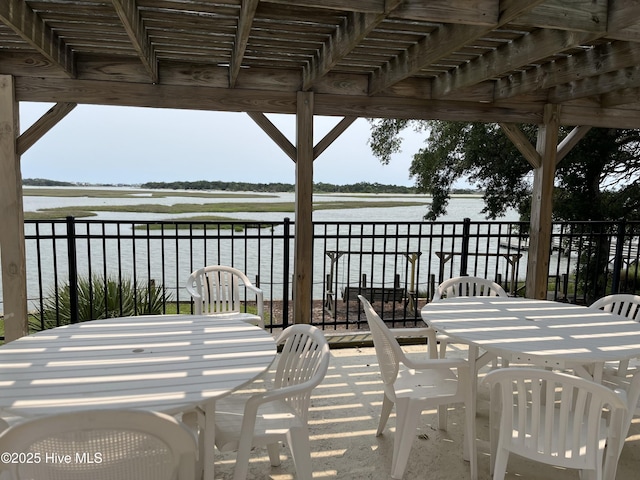 3243 Marsh View Dr SW, Supply, NC 28462 - view of patio with outdoor dining area and a water view