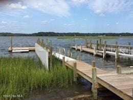 3243 Marsh View Dr SW, Supply, NC 28462 - dock with a water view