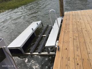 3243 Marsh View Dr SW, Supply, NC 28462 - dock featuring a water view
