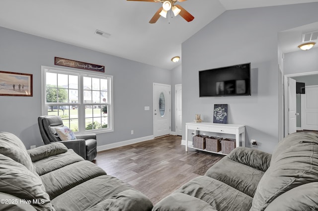 133 Fallbrook Ln, Rocky Point, NC 28457 - living room with ceiling fan, wood finished floors, baseboards, and high vaulted ceiling