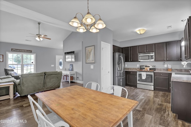 133 Fallbrook Ln, Rocky Point, NC 28457 - dining space featuring a ceiling fan, vaulted ceiling, dark wood-style flooring, and a chandelier