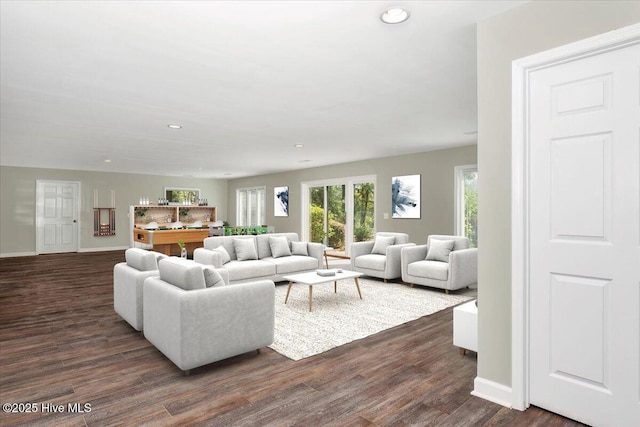 living room with recessed lighting, dark wood finished floors, and baseboards