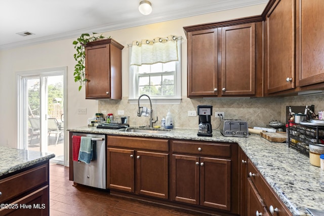 1427 Hammocks Beach Rd, Swansboro, NC 28584 - kitchen with dishwasher, a sink, tasteful backsplash, healthy amount of natural light, and ornamental molding