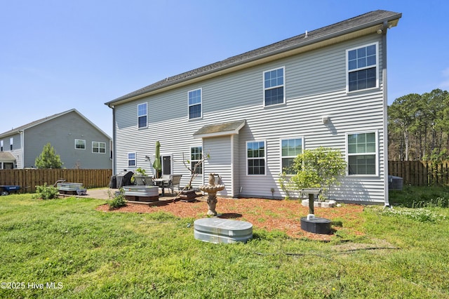 1427 Hammocks Beach Rd, Swansboro, NC 28584 - back of property with a patio and central AC unit