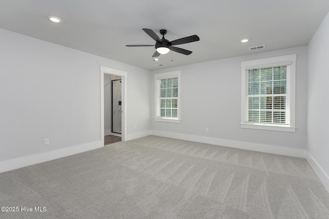 738 Hollybriar Loop Rd SE, Bolivia, NC 28422 - carpeted empty room with baseboards, ceiling fan, and recessed lighting