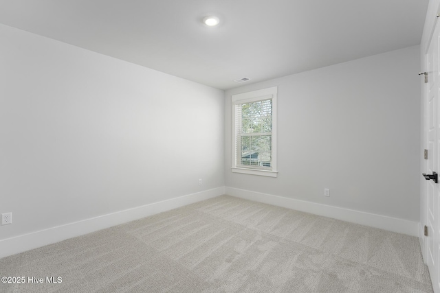 738 Hollybriar Loop Rd SE, Bolivia, NC 28422 - spare room with light carpet and baseboards
