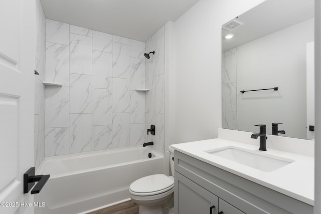 738 Hollybriar Loop Rd SE, Bolivia, NC 28422 - bathroom with vanity, toilet, and bathtub / shower combination