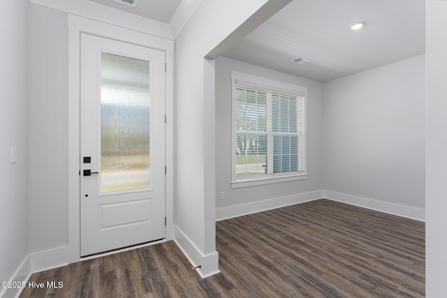 738 Hollybriar Loop Rd SE, Bolivia, NC 28422 - entrance foyer with dark wood-type flooring and baseboards