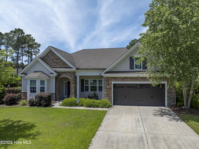 429 Canvasback Ln, Sneads Ferry, NC 28460 - view of front of property with stone siding, driveway, a garage, and a front yard
