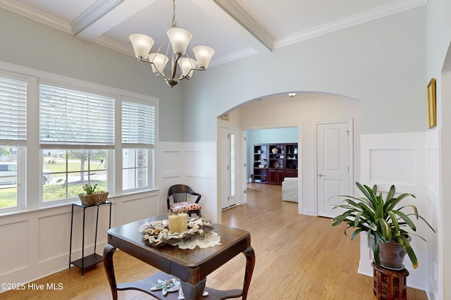 429 Canvasback Ln, Sneads Ferry, NC 28460 - office space with a decorative wall, arched walkways, plenty of natural light, a chandelier, and beamed ceiling