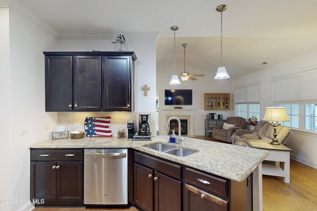 429 Canvasback Ln, Sneads Ferry, NC 28460 - kitchen featuring dishwasher, a sink, a ceiling fan, light wood-type flooring, and a peninsula