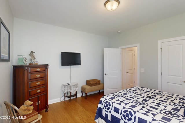 429 Canvasback Ln, Sneads Ferry, NC 28460 - bedroom featuring wood finished floors and baseboards