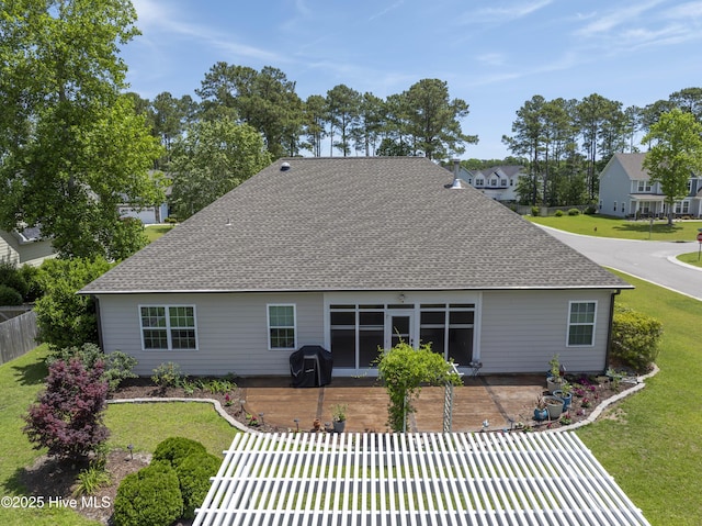 429 Canvasback Ln, Sneads Ferry, NC 28460 - rear view of house featuring a patio and a shingled roof