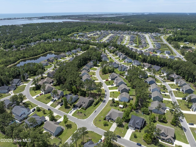 429 Canvasback Ln, Sneads Ferry, NC 28460 - aerial overview of property's location with a nearby body of water, nearby suburban area, and a forest