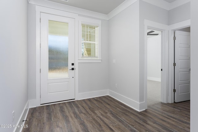 735 Hollybriar Loop Rd SE, Bolivia, NC 28422 - doorway to outside with dark wood-style flooring and baseboards