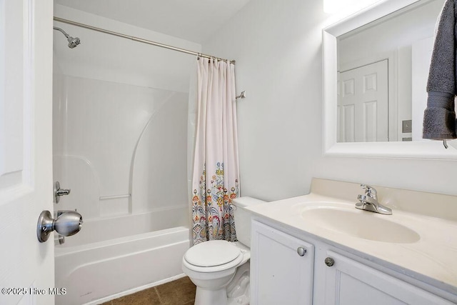 full bathroom featuring shower / bath combo with shower curtain, toilet, tile patterned flooring, and vanity