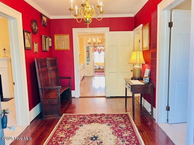 45 Hb Lewis Rd, Clinton, NC 28328 - hallway with a chandelier, hardwood / wood-style floors, and ornamental molding