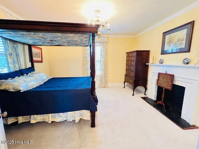 45 Hb Lewis Rd, Clinton, NC 28328 - carpeted bedroom with crown molding, a fireplace with flush hearth, a chandelier, and baseboards