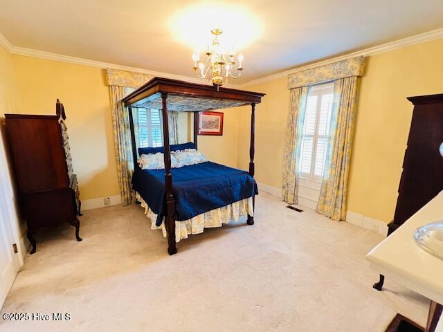 45 Hb Lewis Rd, Clinton, NC 28328 - carpeted bedroom featuring crown molding, baseboards, and a chandelier