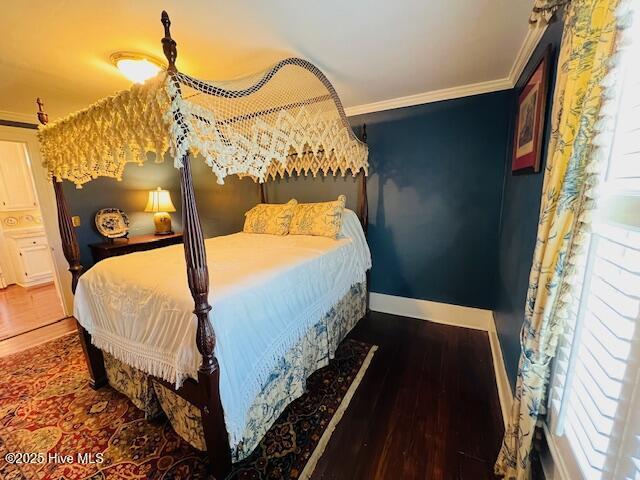 45 Hb Lewis Rd, Clinton, NC 28328 - bedroom featuring crown molding, baseboards, and wood finished floors
