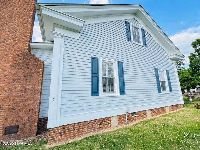 45 Hb Lewis Rd, Clinton, NC 28328 - view of property exterior with crawl space and a lawn