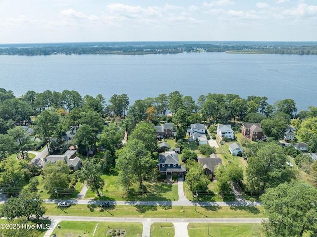 bird's eye view featuring a water view and a residential view